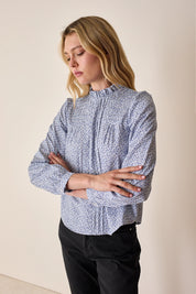 Cotton top with pleats and ruffled collar