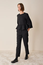 Top con balza in lana stretch