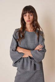 Top in blend di lana con balza