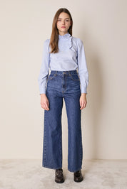 Top con abbottonatura laterale