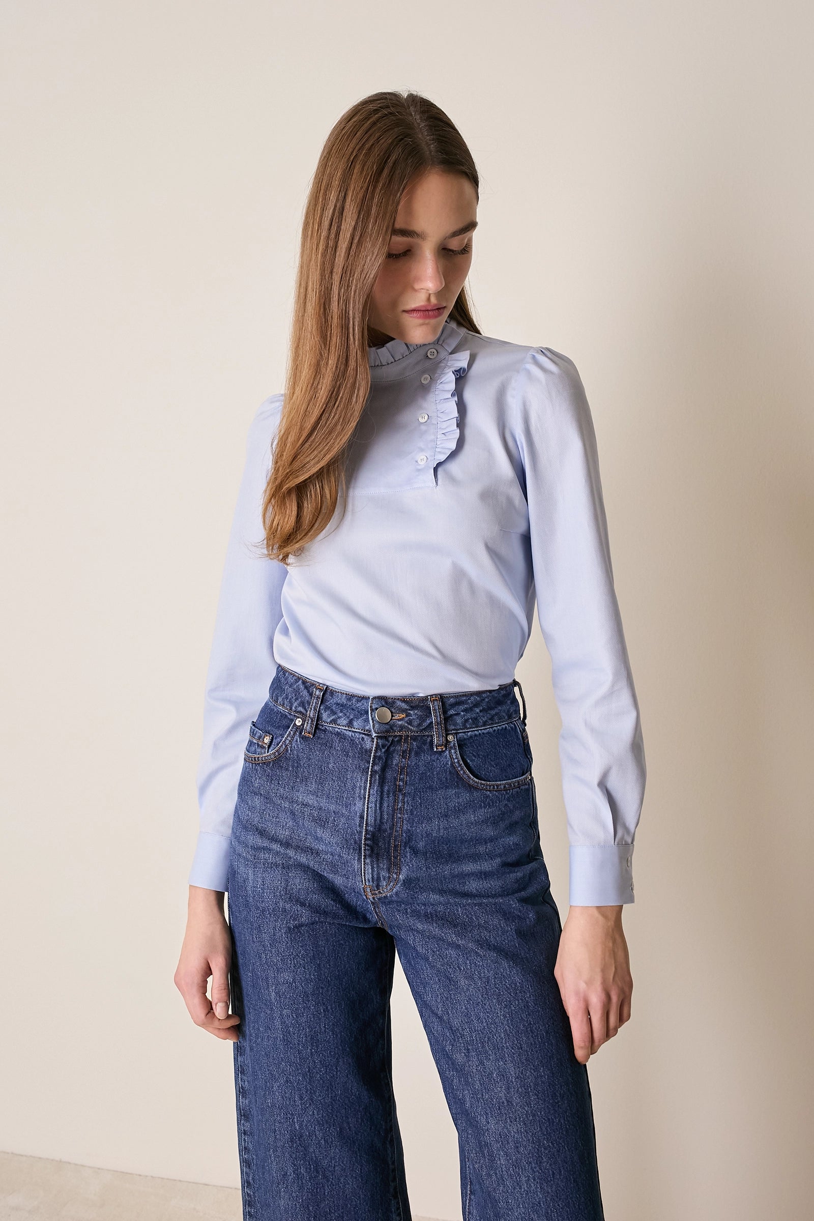 Top con abbottonatura laterale