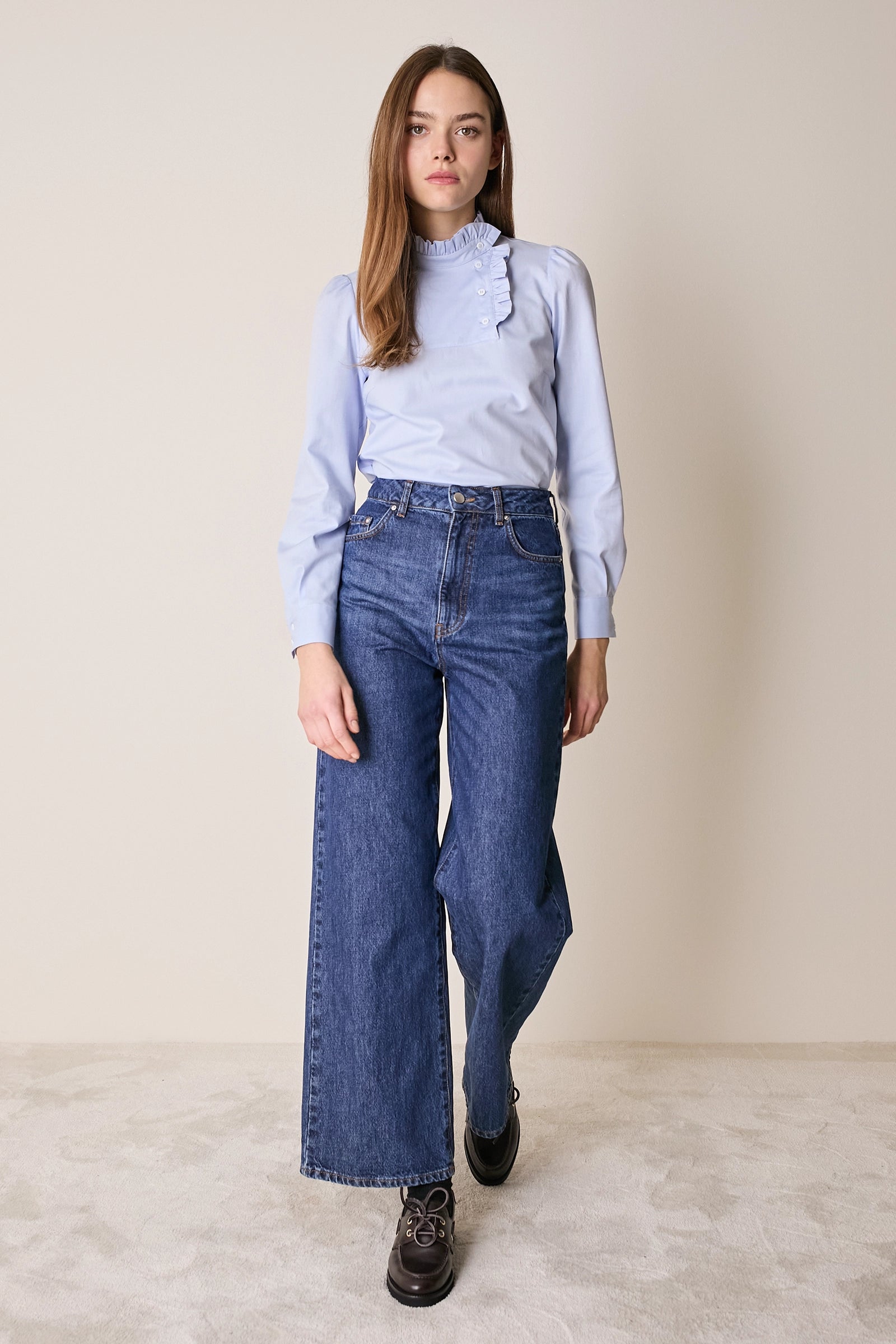 Top con abbottonatura laterale