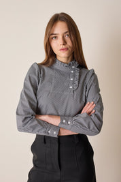 Top con abbottonatura laterale