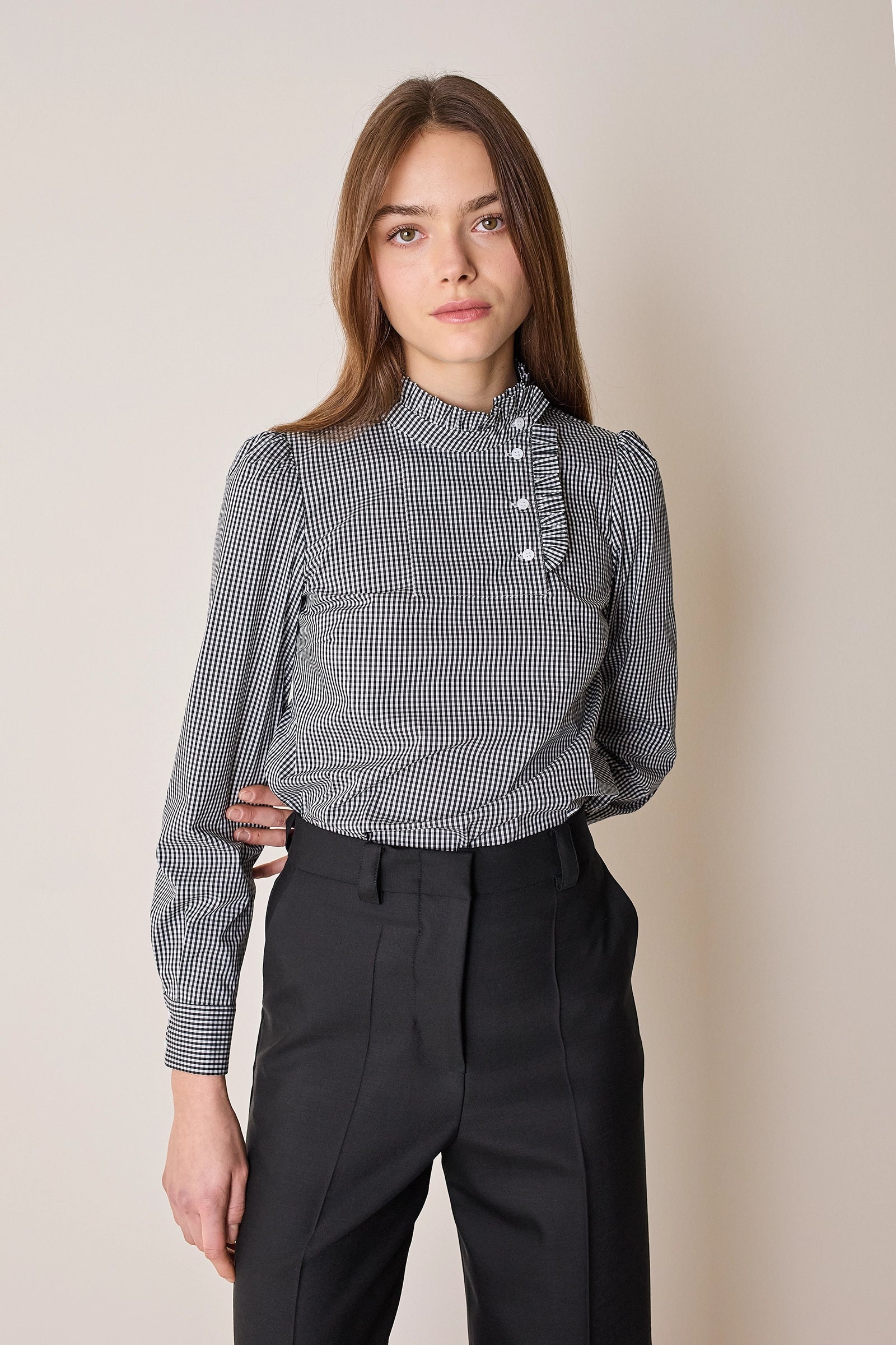 Top con abbottonatura laterale