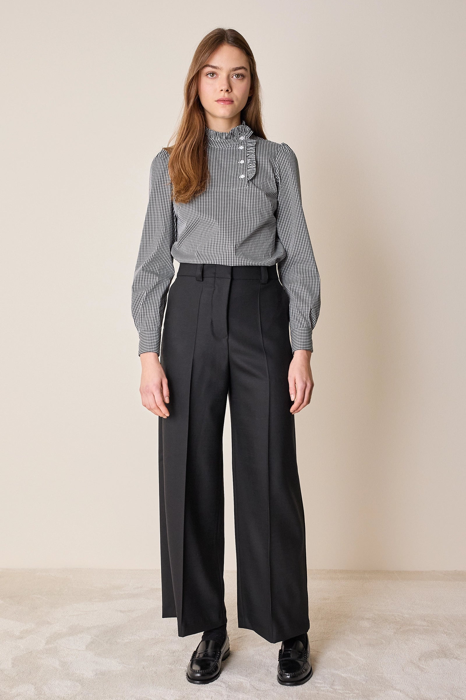 Top con abbottonatura laterale