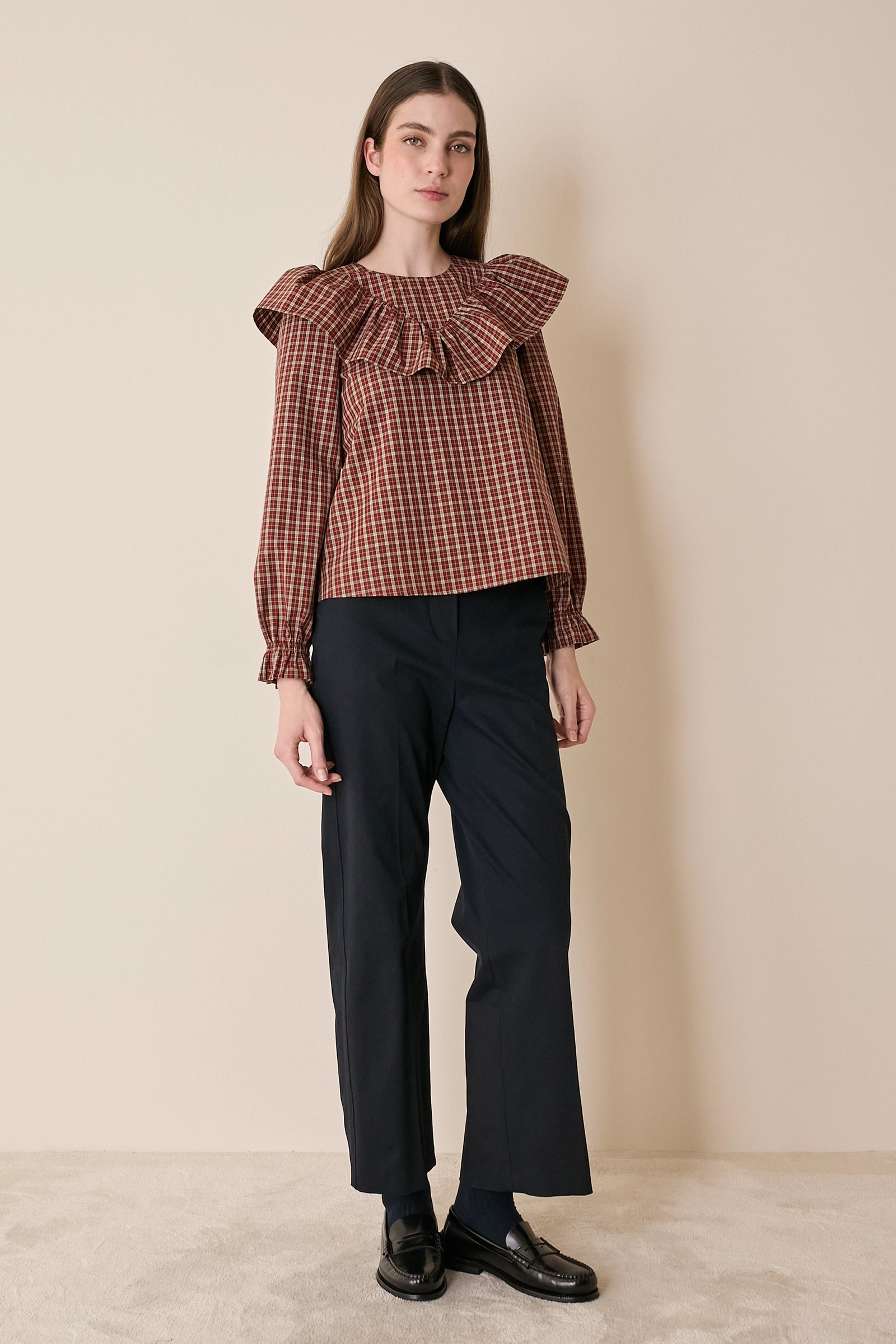 Top a quadretti con maxi volant