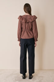 Top a quadretti con maxi volant