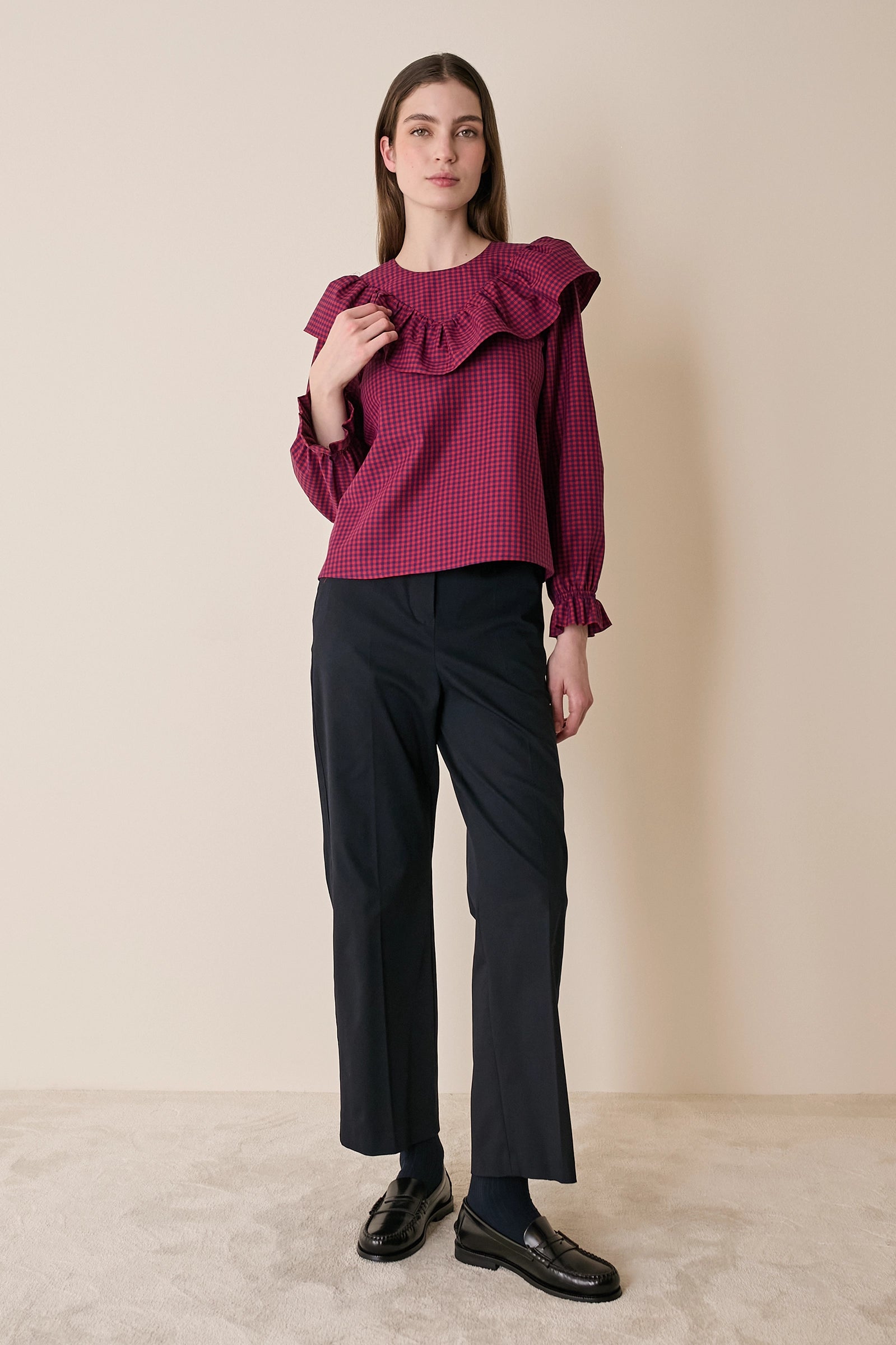 Top a quadretti con maxi volant