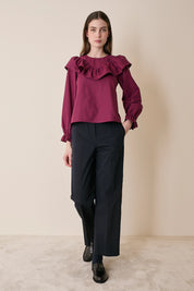 Top a quadretti con maxi volant