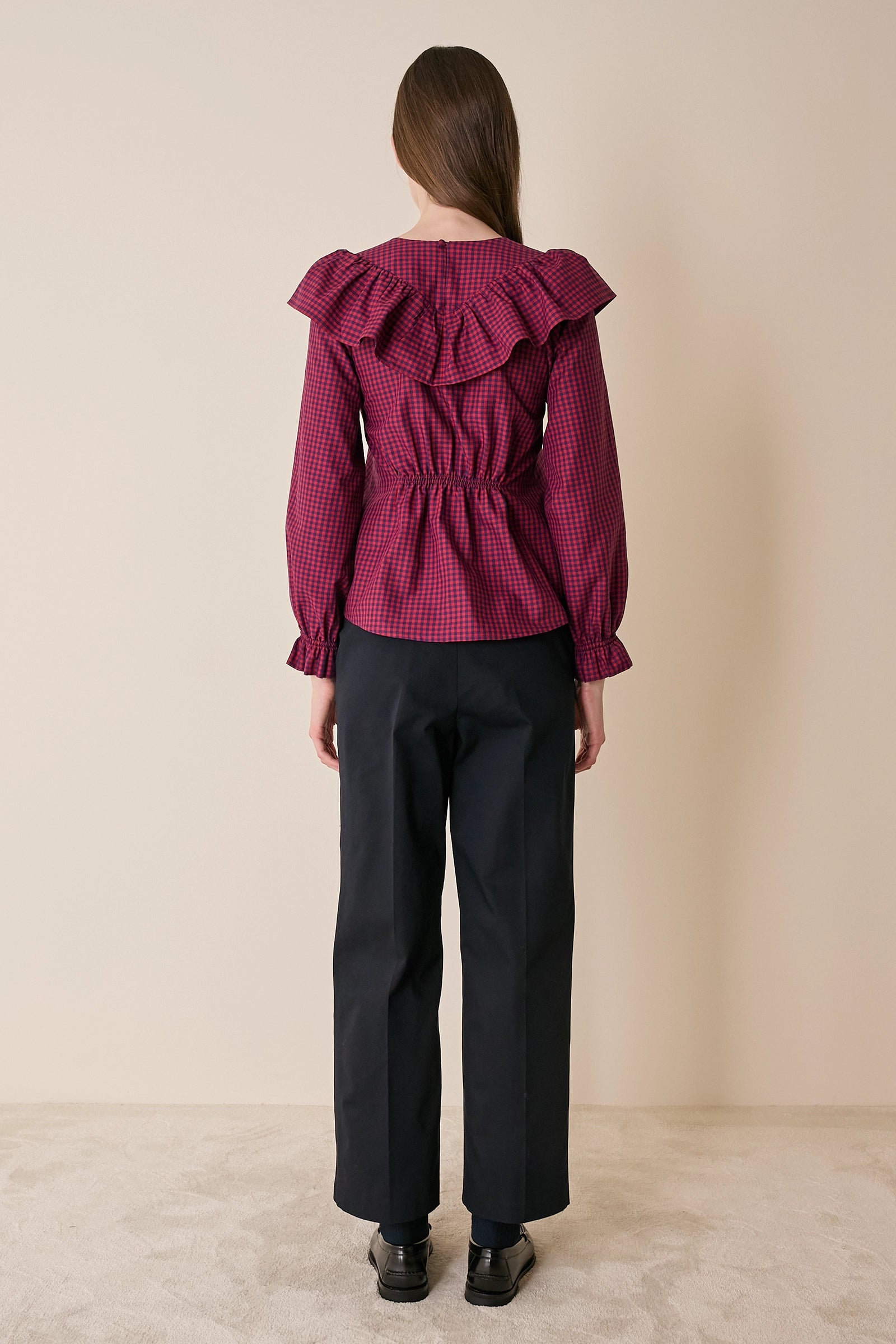 Top a quadretti con maxi volant