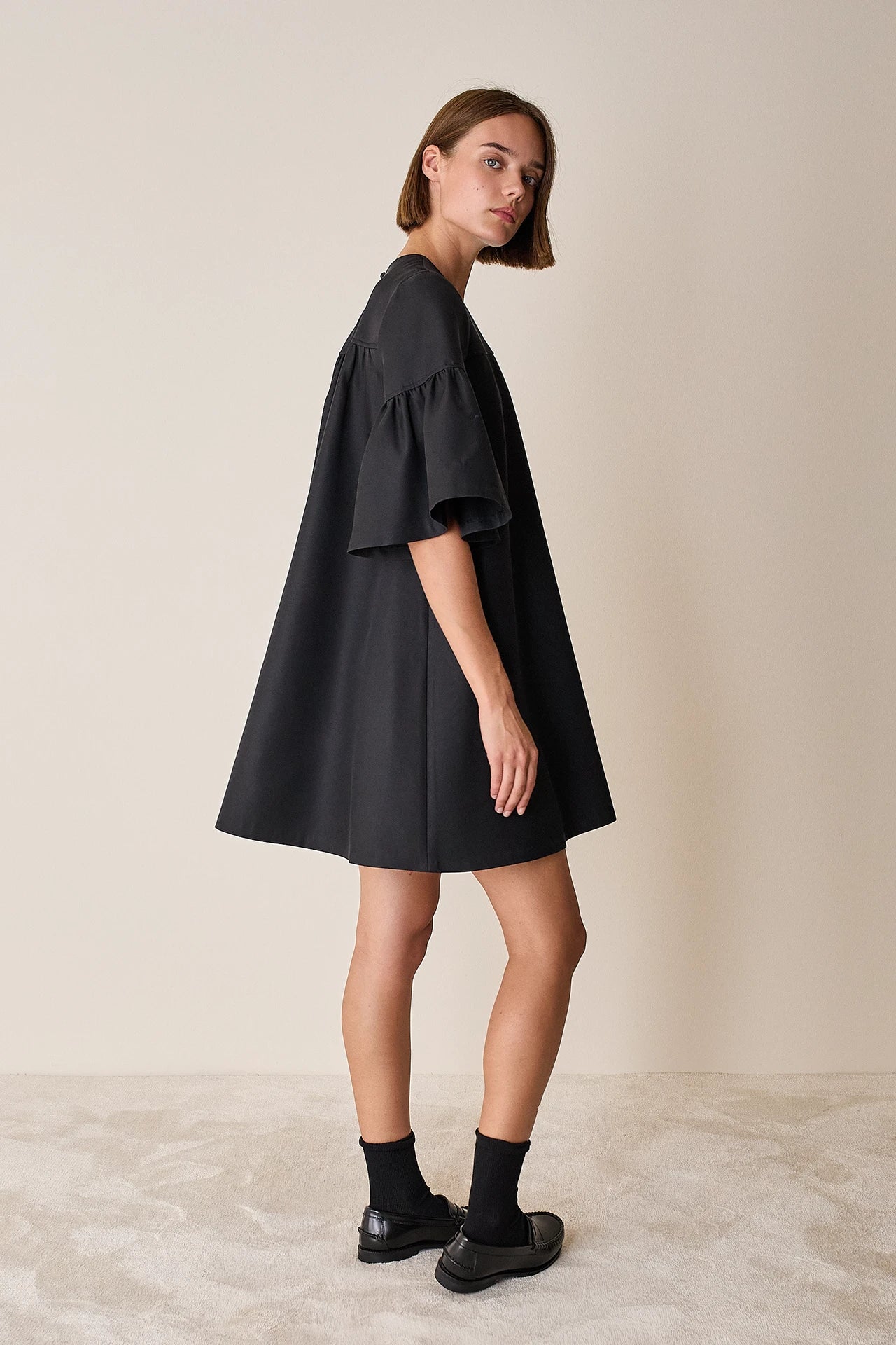 Structured dress with bell sleeves