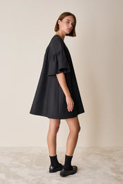 Structured dress with bell sleeves