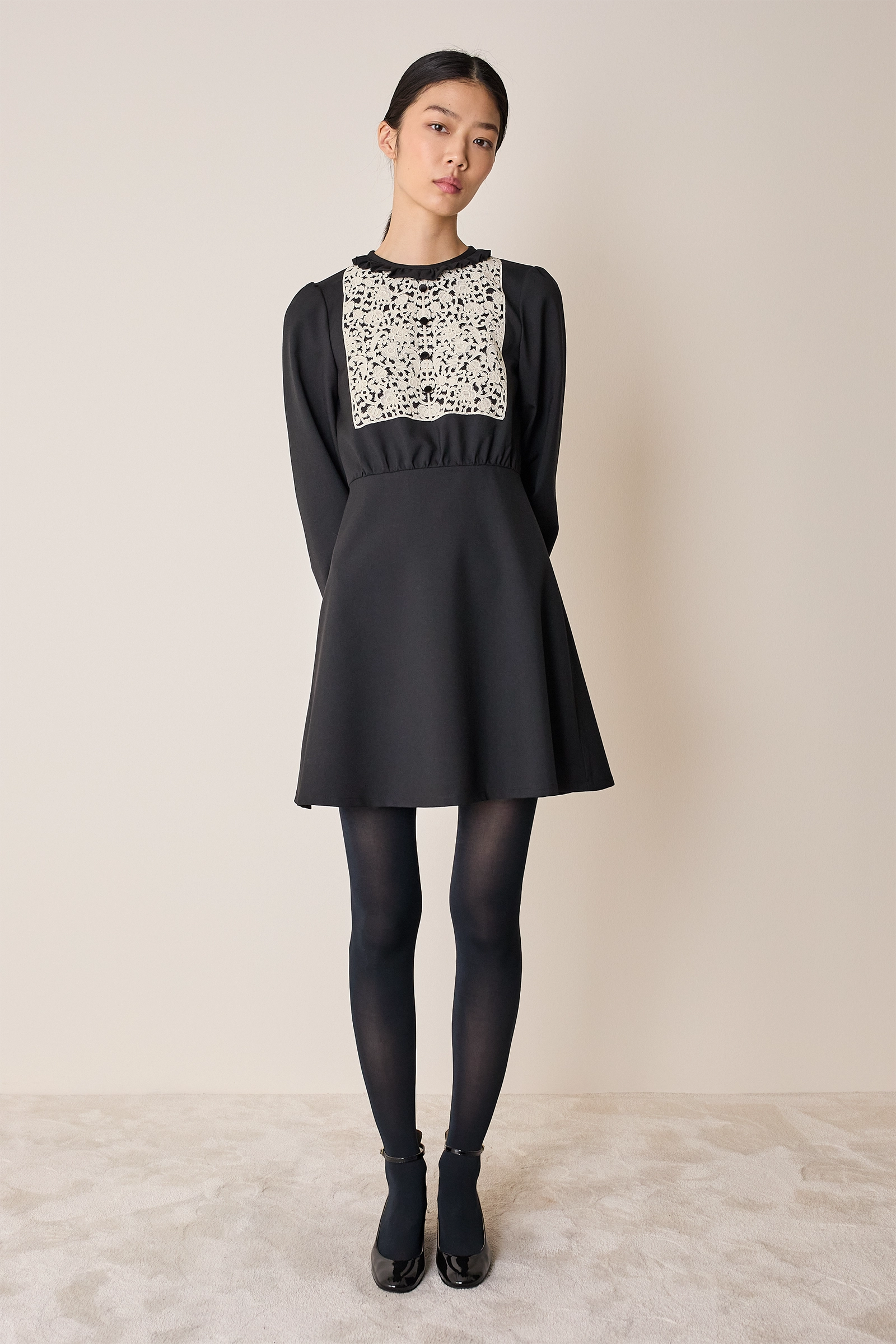 Wool dress with macramé lace insert