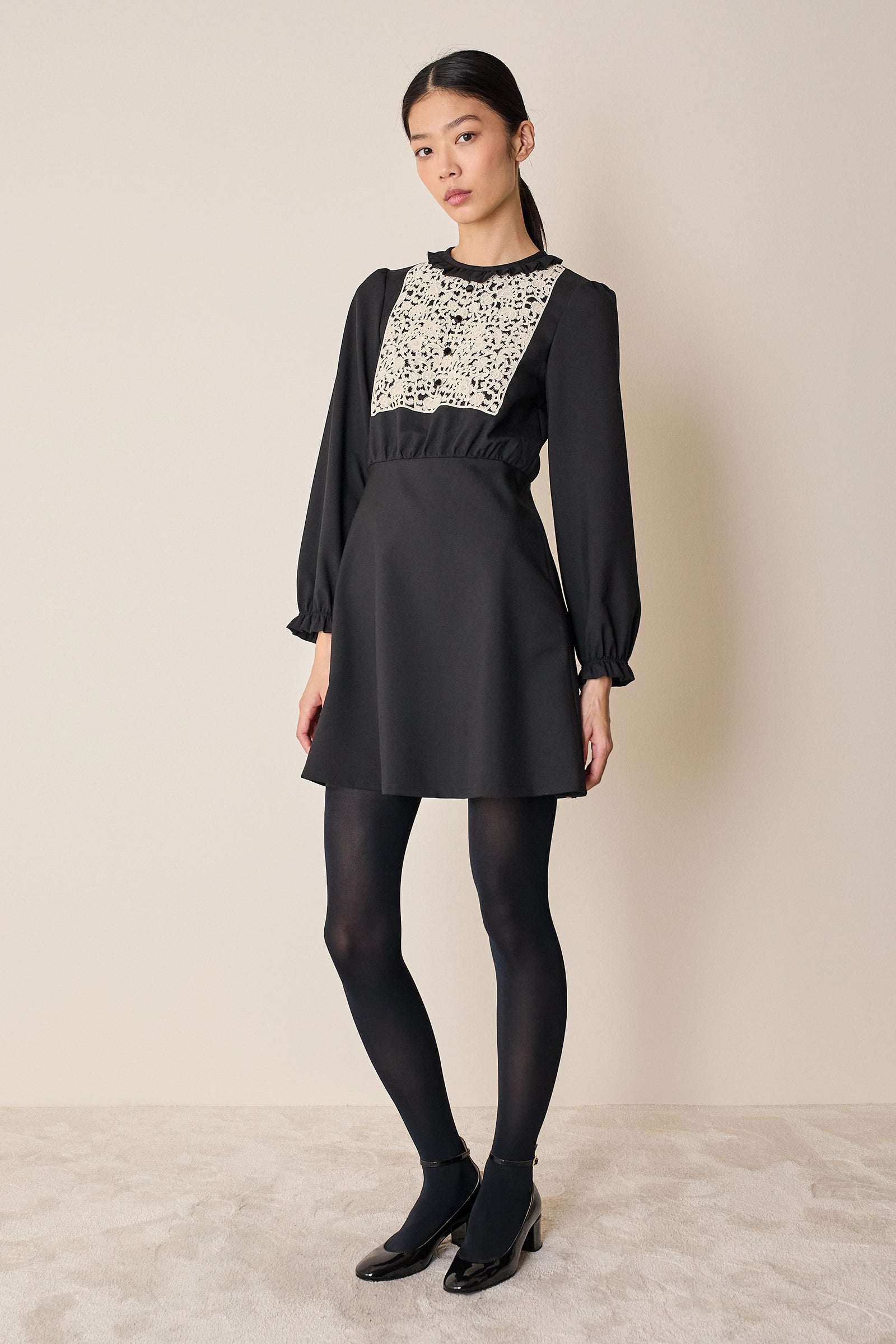 Wool dress with macramé lace insert