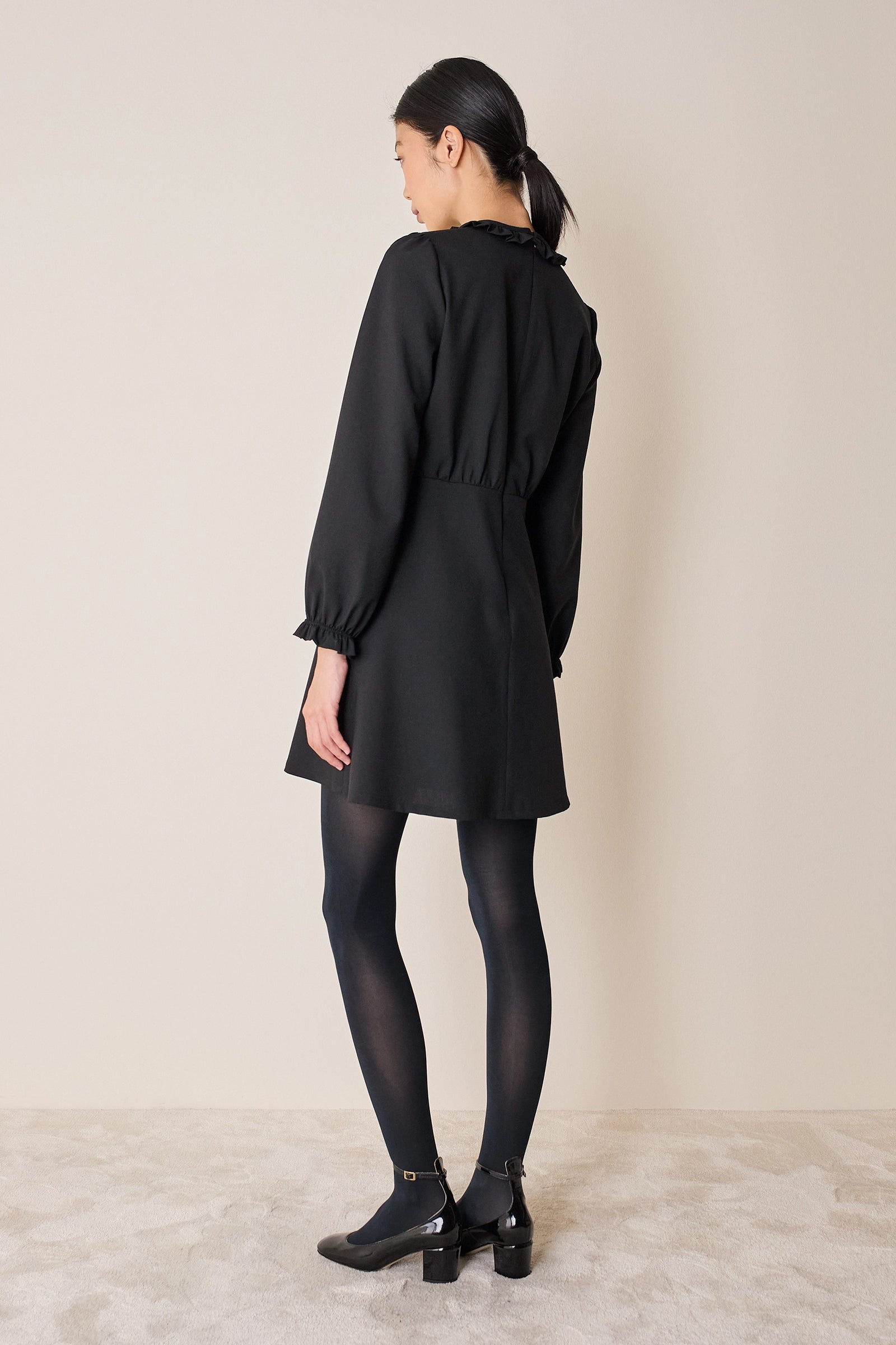 Wool dress with macramé lace insert