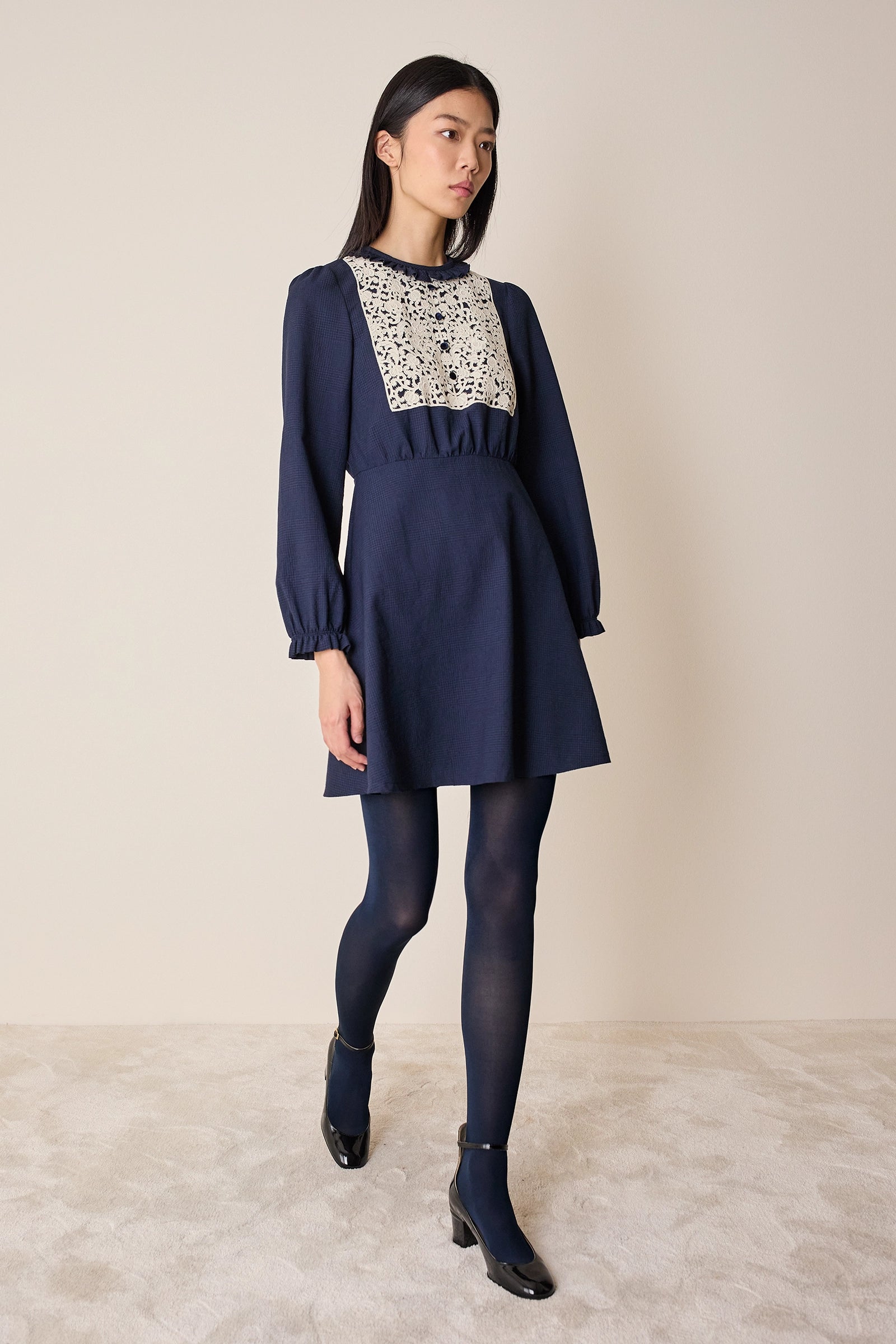 Wool dress with macramé lace insert