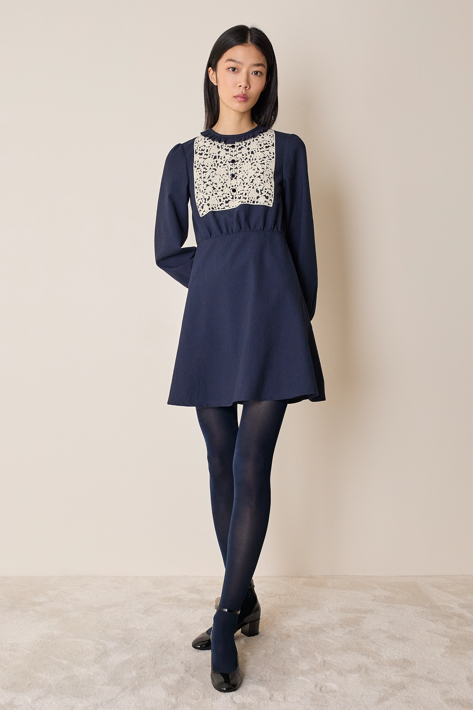 Wool dress with macramé lace insert