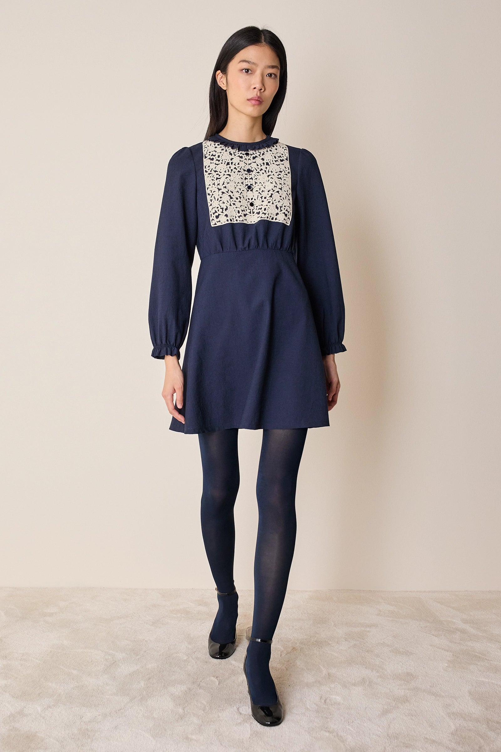 Wool dress with macramé lace insert