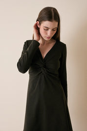 Abito in jersey di lana con scollo incrociato