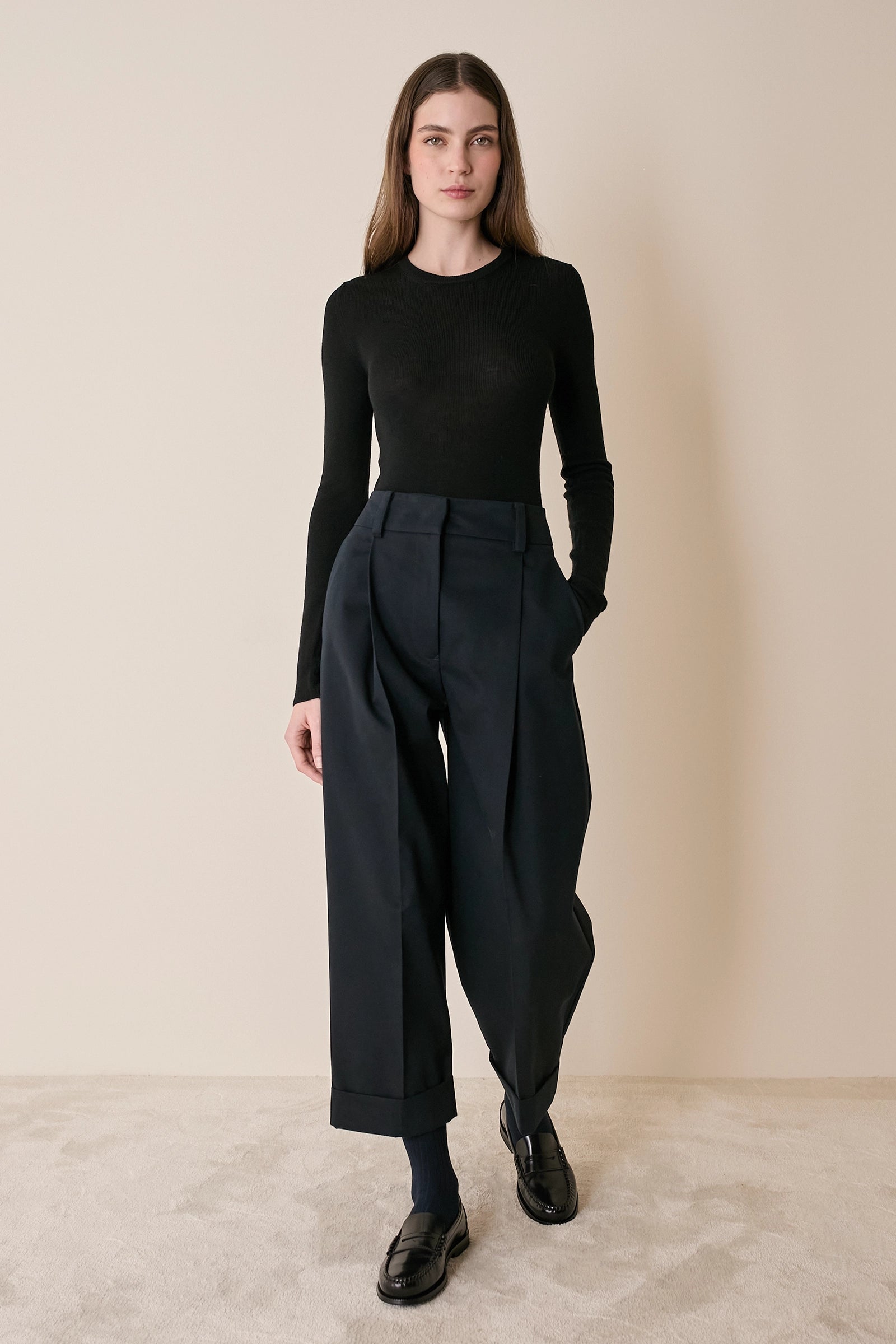 Pantaloni in cotone con piega e risvolto