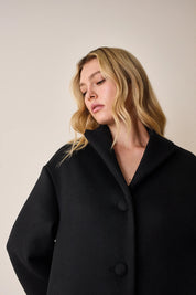 Egg-shaped virgin wool coat