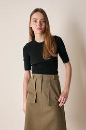 Gonna midi con tasche applicate