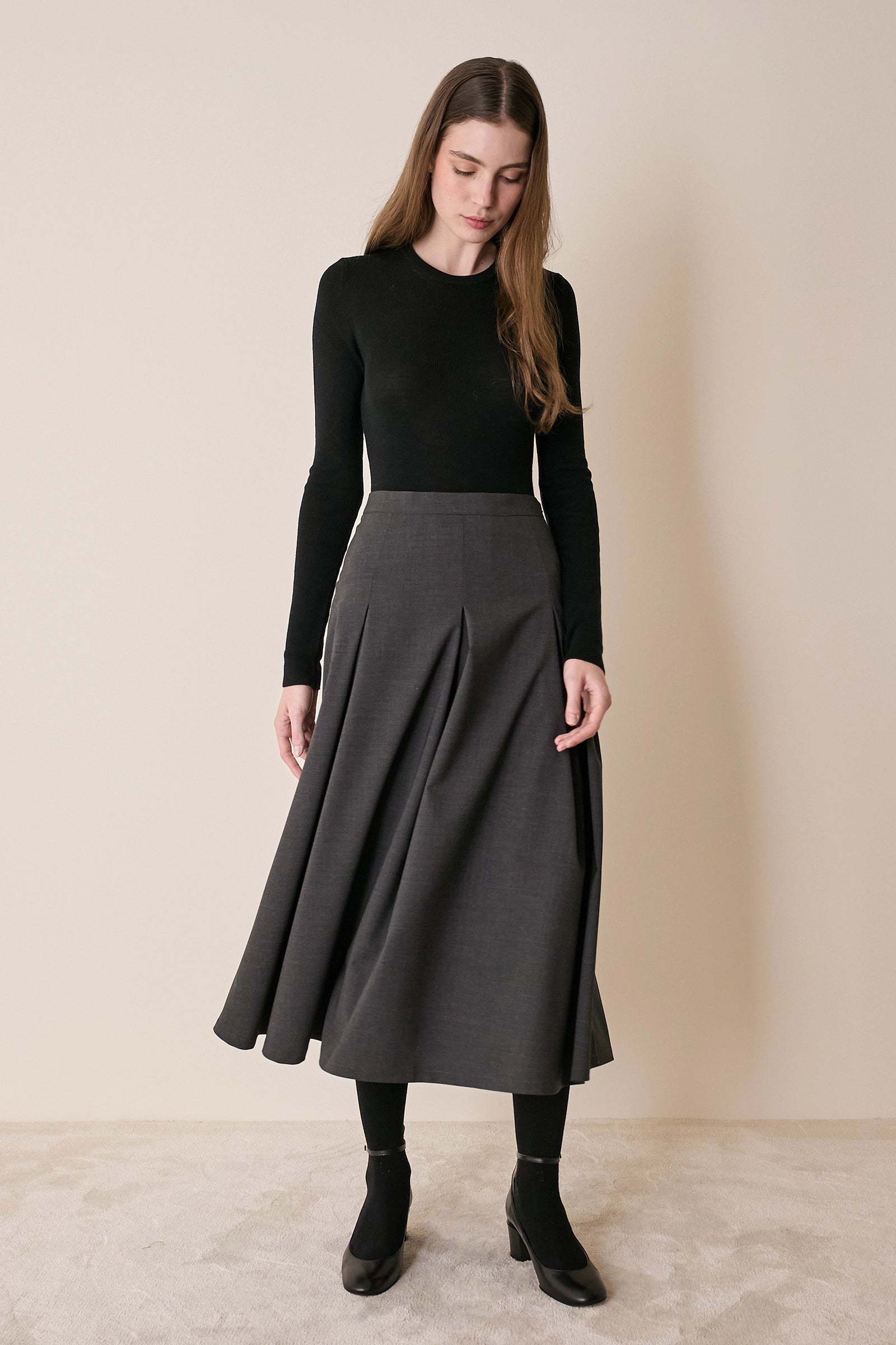 Gonna midi a pieghe in frescolana