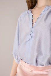 Top a righe in blend di seta