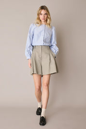 Camicia girocollo con maniche a sbuffo