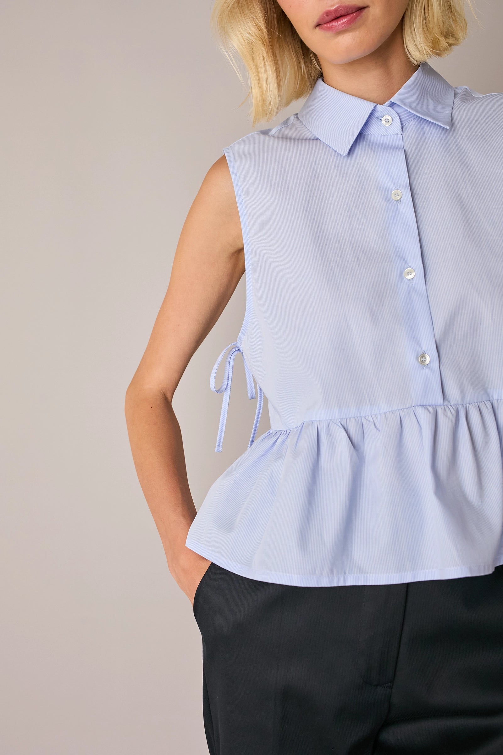 Sleeveless tie-detail blouse