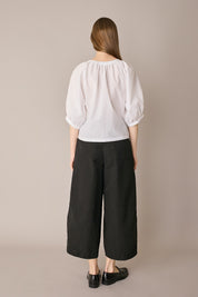 Top in cotone con bottoncini rivestiti
