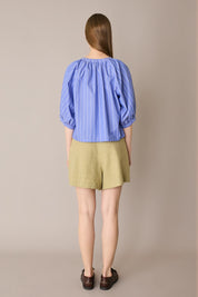 Top in cotone con bottoncini rivestiti