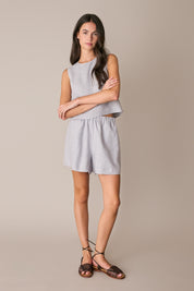 Top in lino con bottoncini