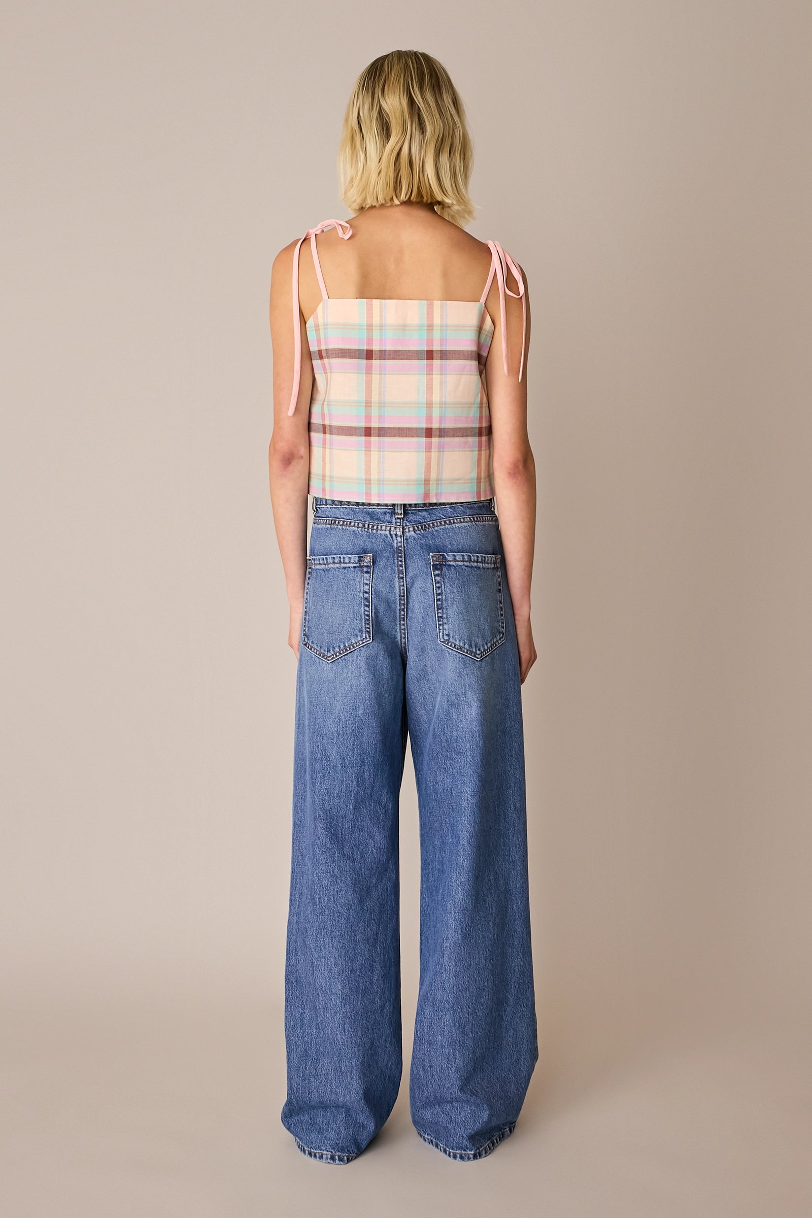 Spaghetti strap top with ruffles