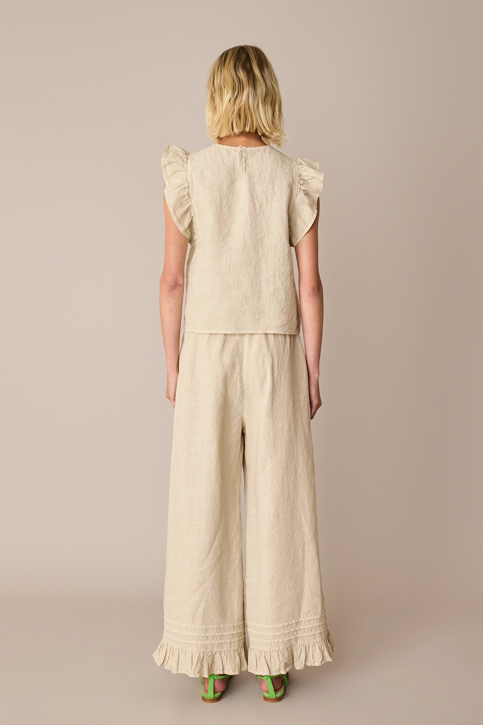 Linen trousers with frill hem
