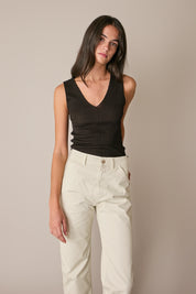 Pantaloni con fondo sfrangiato