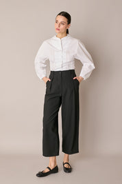Pantaloni fluidi con pinces