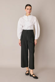 Pantaloni fluidi con pinces