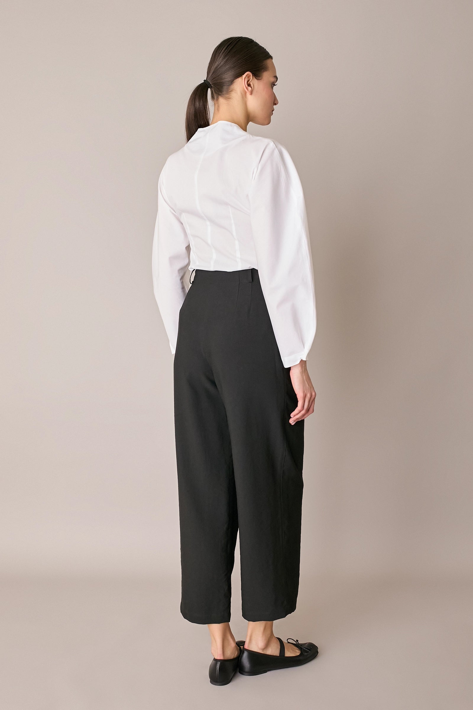 Pantaloni fluidi con pinces