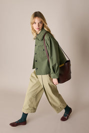 Pantaloni in cotone con piega e risvolto