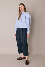 Pantaloni in blend di lino con piega e risvolto