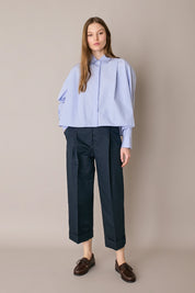 Pantaloni in blend di lino con piega e risvolto