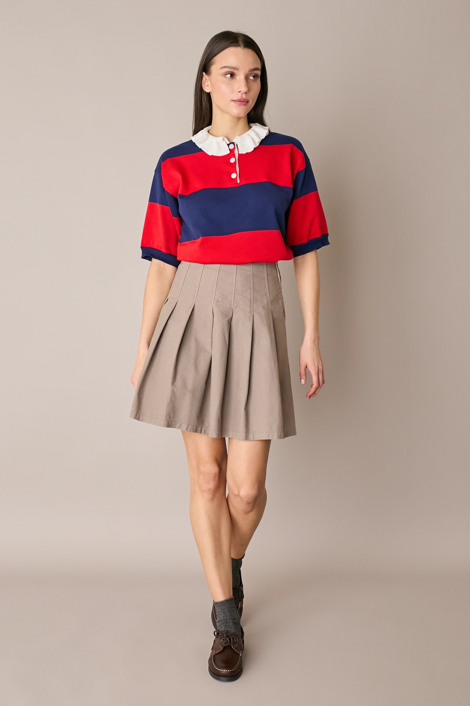 Gonna corta a pieghe