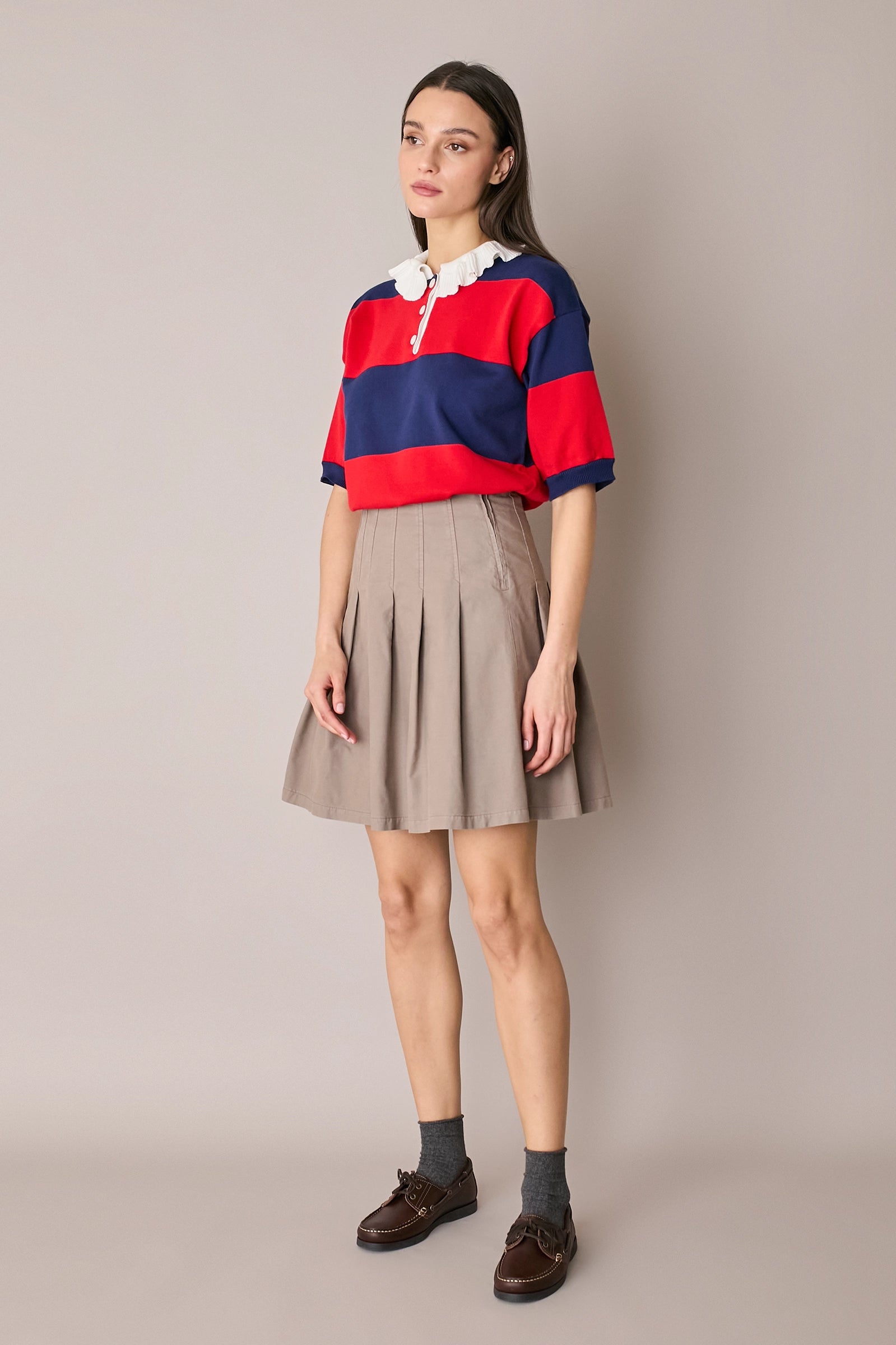 Gonna corta a pieghe