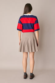 Gonna corta a pieghe