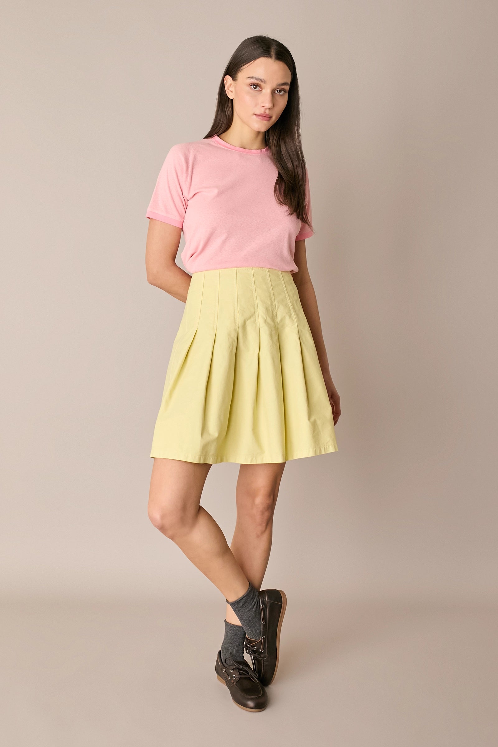 Gonna corta a pieghe