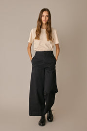 Pantaloni con tiranti in vita