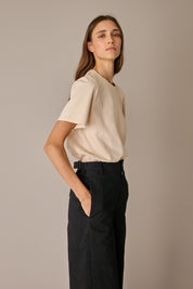 Pantaloni con tiranti in vita