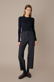 Pantaloni in lana con fiocchi in seta