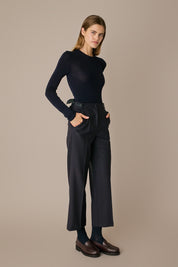 Pantaloni in lana con fiocchi in seta